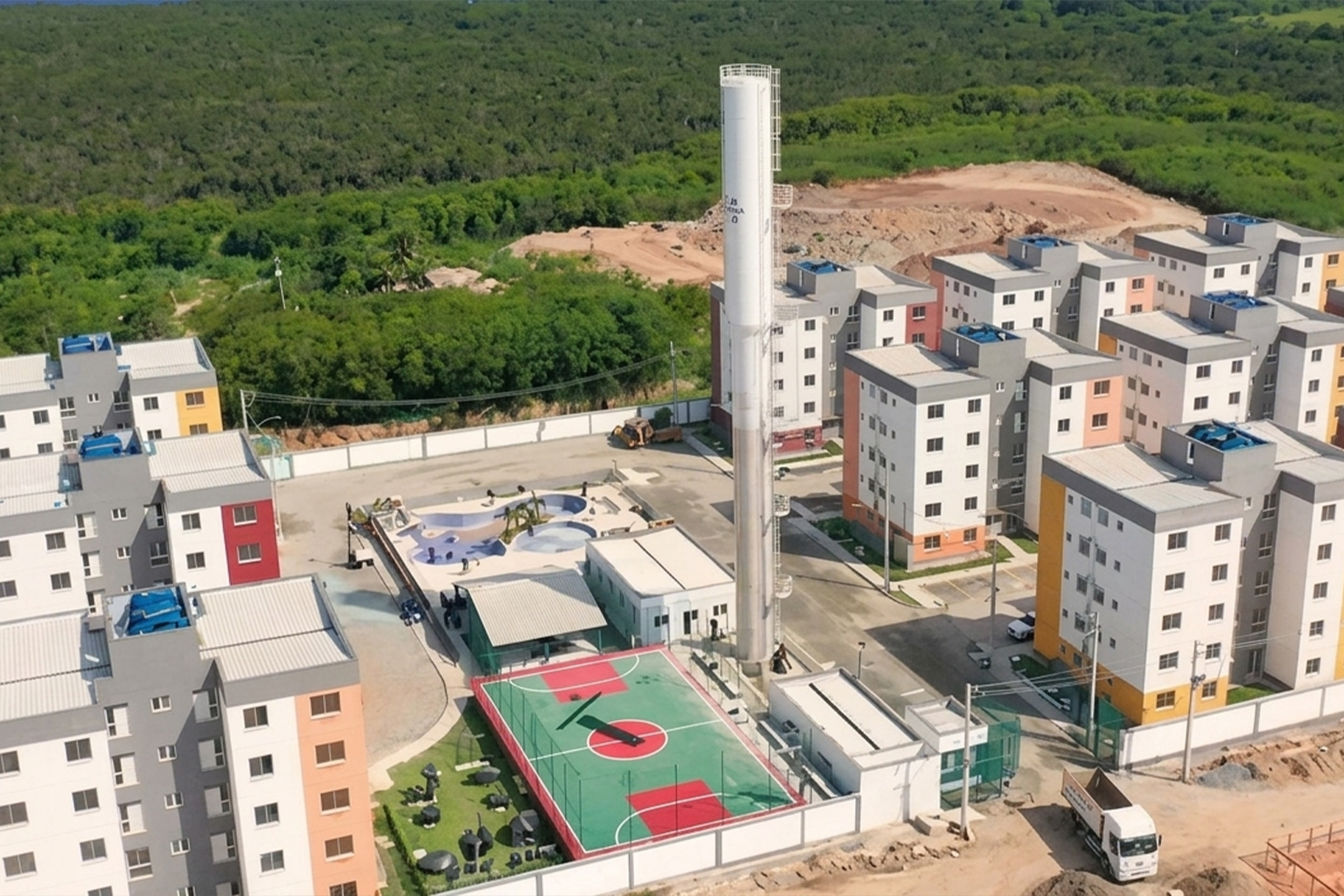 Caixa d'água tipo taça em condomínio com prédios e área de lazer